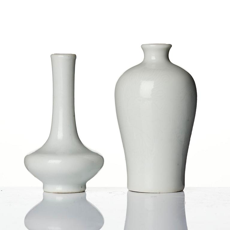 A pair of white glazed vases, Qing dynasty, 18th century.