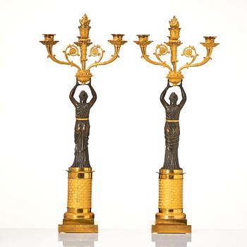 A pair of French Empire four-light candelabra, attributed to Francois Rabiat (bronze maker in Paris 1756-1815).