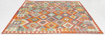 A kilim carpet, c. 295 x 203.