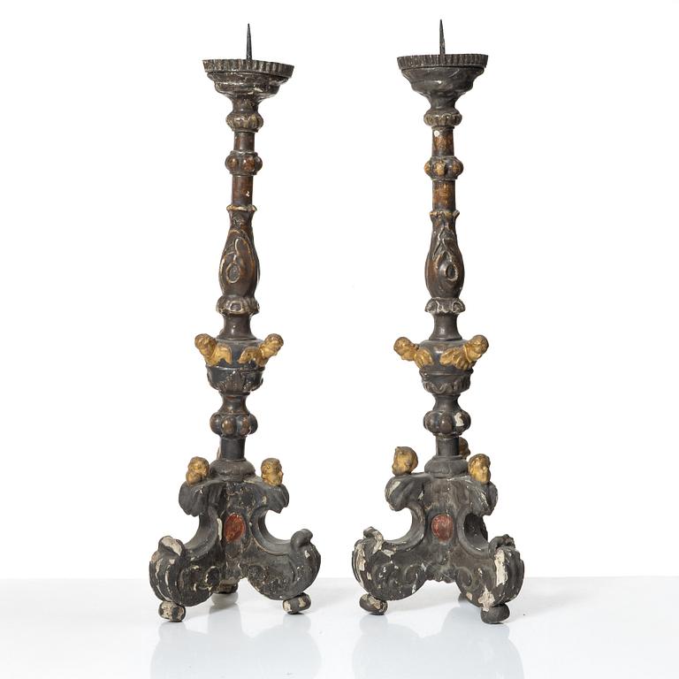 A pair of Baroque style candleholders, 19th Century.