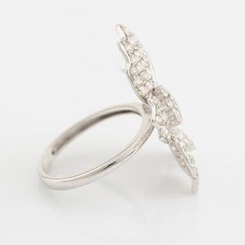 Brilliant cut diamond flower ring.