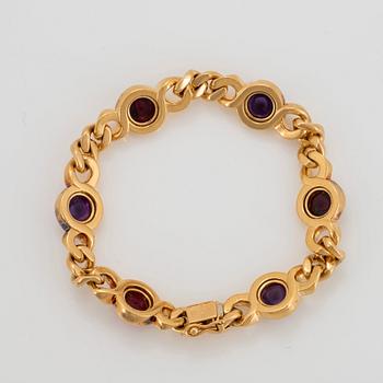 Bulgari armband 18K guld med cabochonslipade ametister och turmaliner.