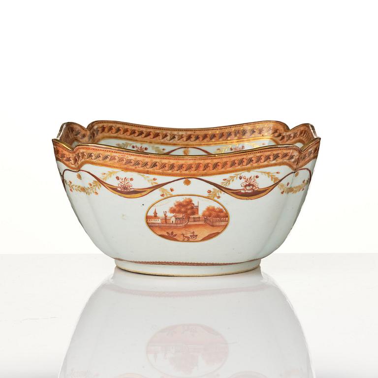 An oval vegetable tureen with cover and a pillow shaped bowl, Qing dynasty, late 18th century.