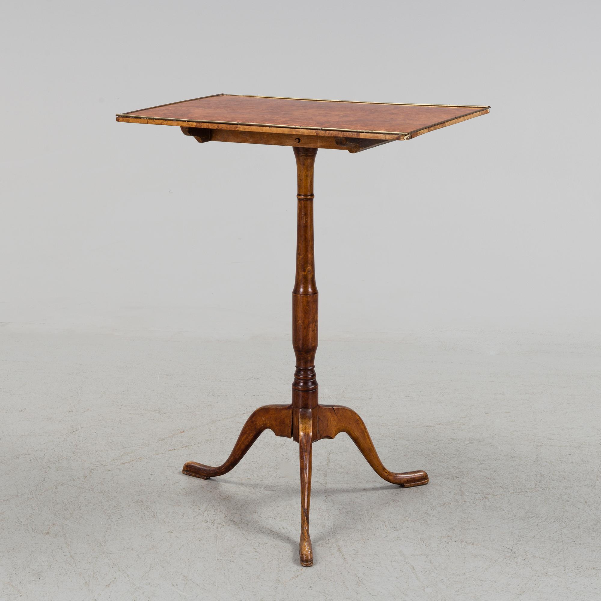 An early 19th century folding table.