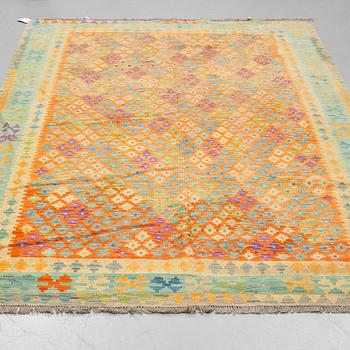 A CARPET, Kilim 300 x 200 cm.