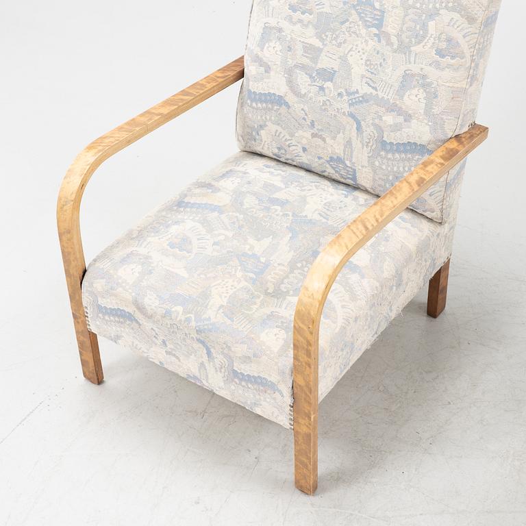 A pair of 1930's armchairs.