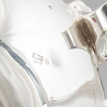 A 20th century silver coffee pot, creamer and sugar bowl. Swedish import mark.