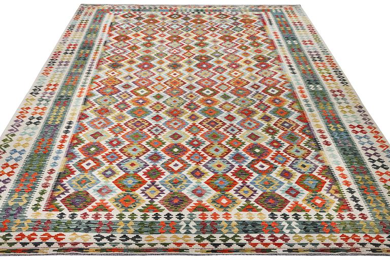 A Kilim carpet, c. 490 x 310 cm.