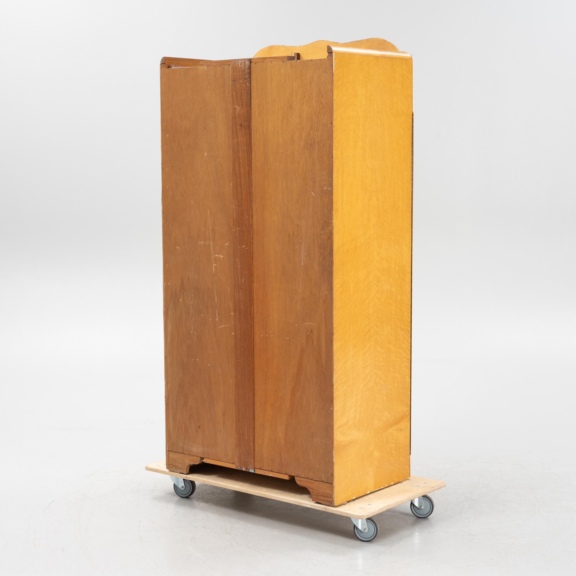 A Durable Suites Ltd birch cabinet, second half of the 20th century.