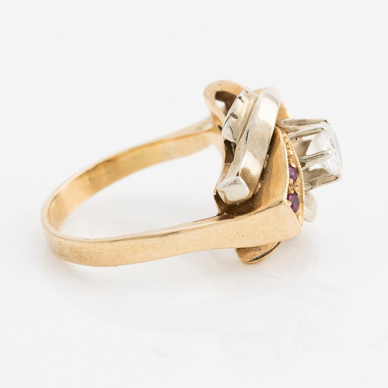 Ring, gold with white stone and small rubies.