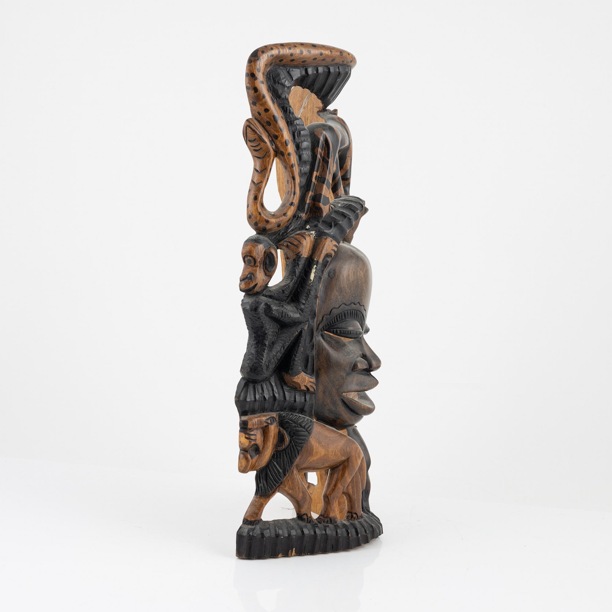 A wooden mask, Gambia, 21st Century.