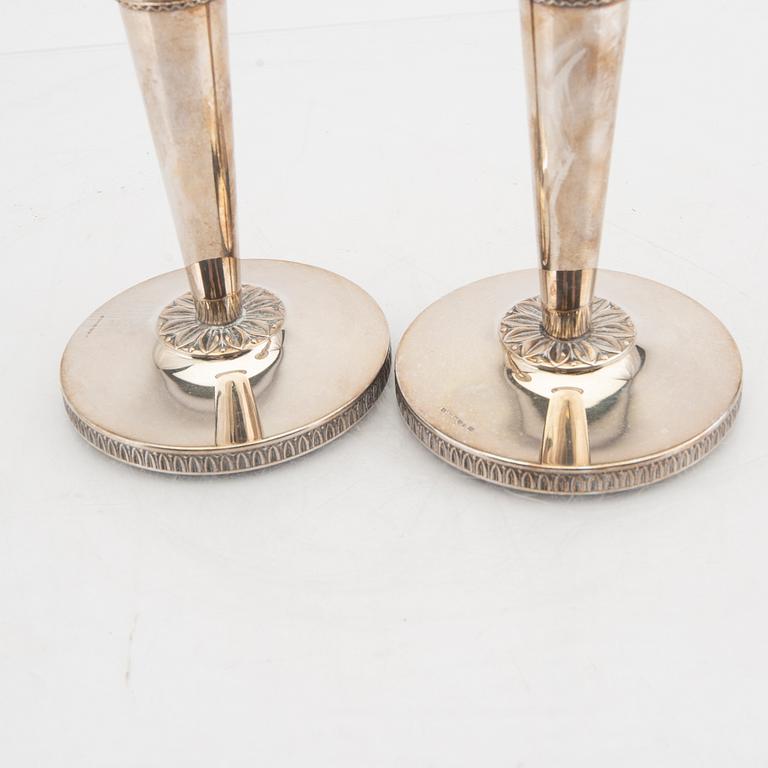 A Swedish 20th century pair of silver candle sticks mark of K&E Carlson Gohtenburg 1965.