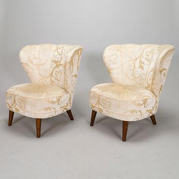 A pair of late 20th century armchairs.