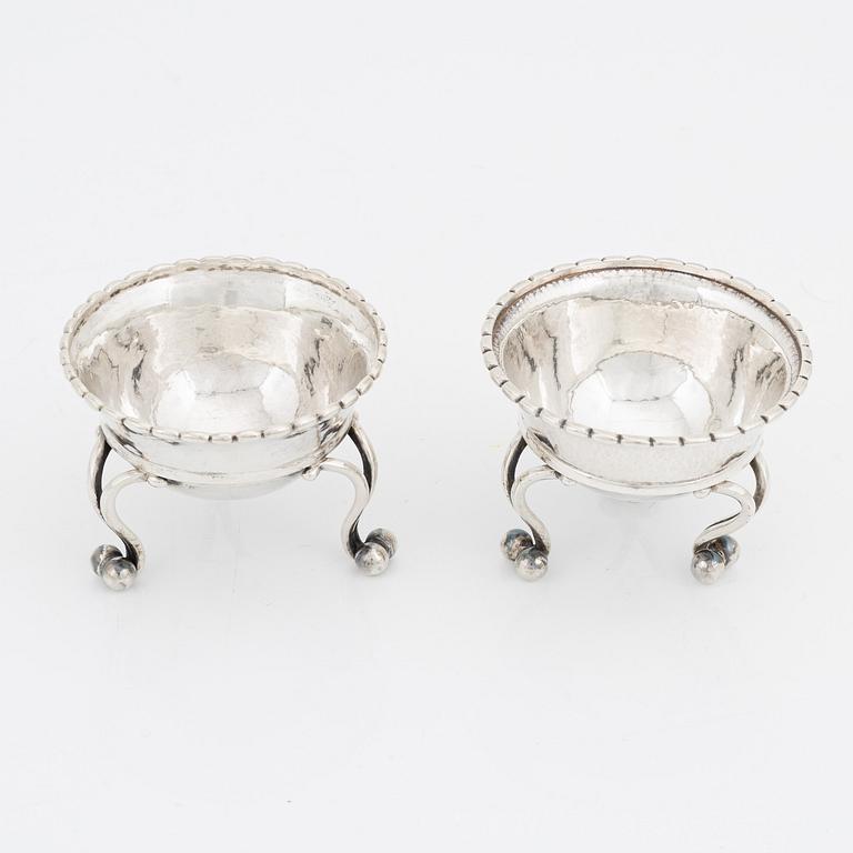 Georg Jensen, two silver salt cellars, model 20, Denmark, 1919- c. 1927.