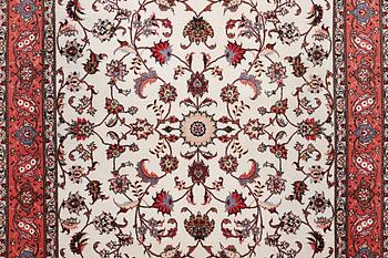 A rug, Tabriz, part silk, 50 raj, ca. 207 x 152 cm.