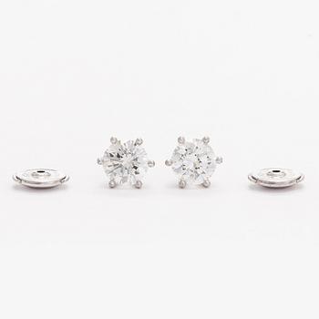Bucherer, a pair of 18K white gold earrings with brilliant-cut diamond. SJL-certificate.