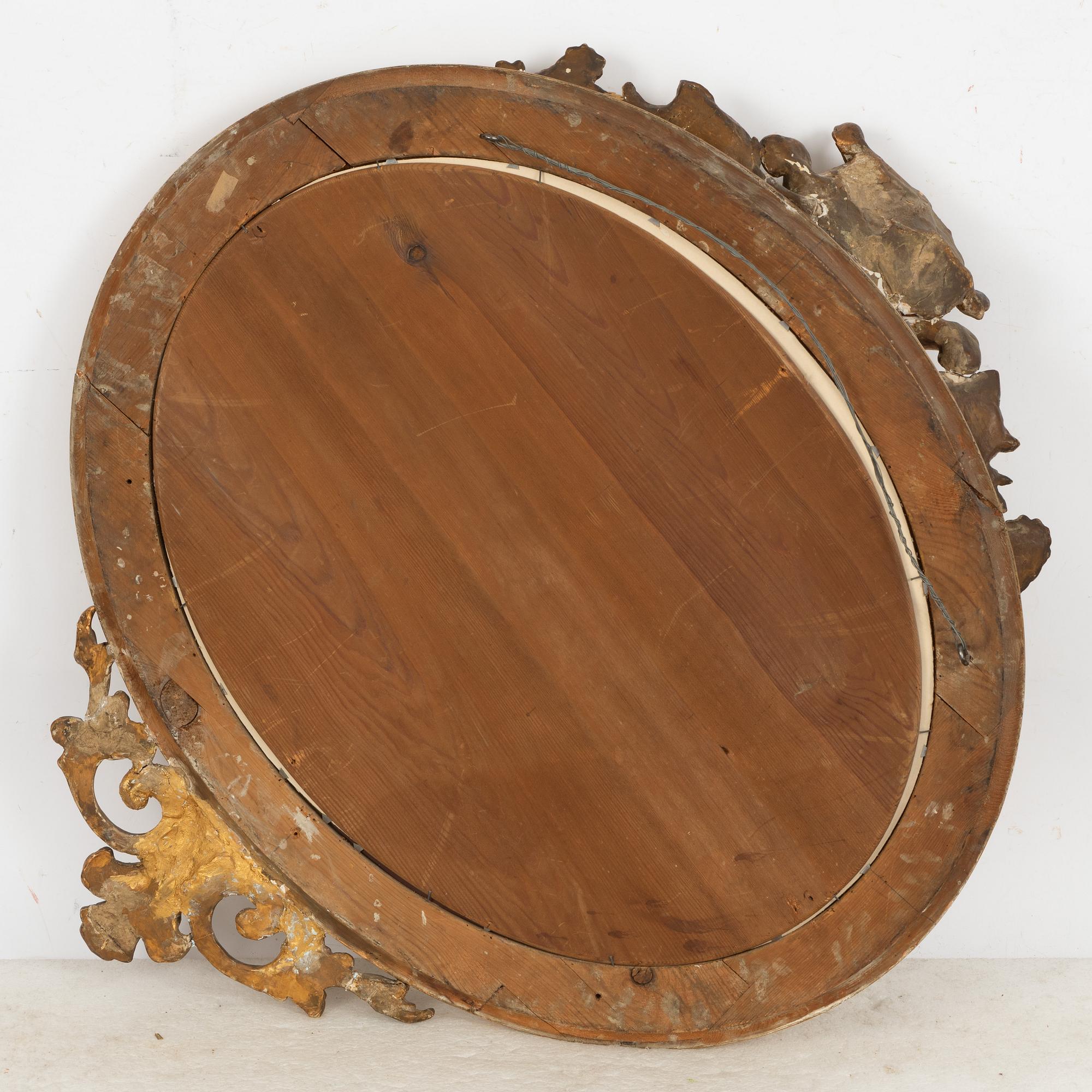 A Rococo Revival mirror, second half of the 19th century.