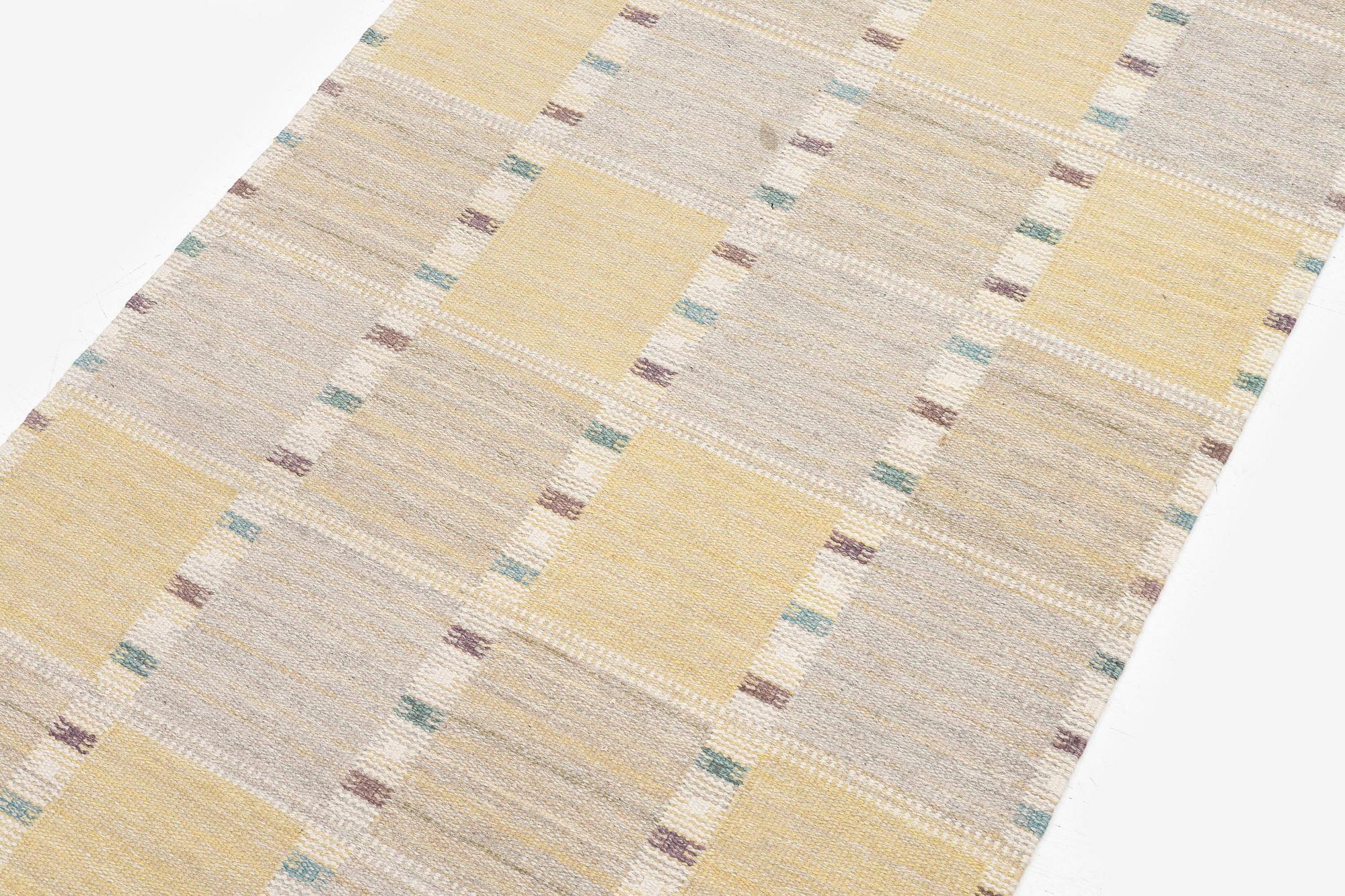 Barbro Nilsson, a 'Falurutan gul S' carpet, flat weave, c. 226 x 114 cm, signed AB MMF BN.
