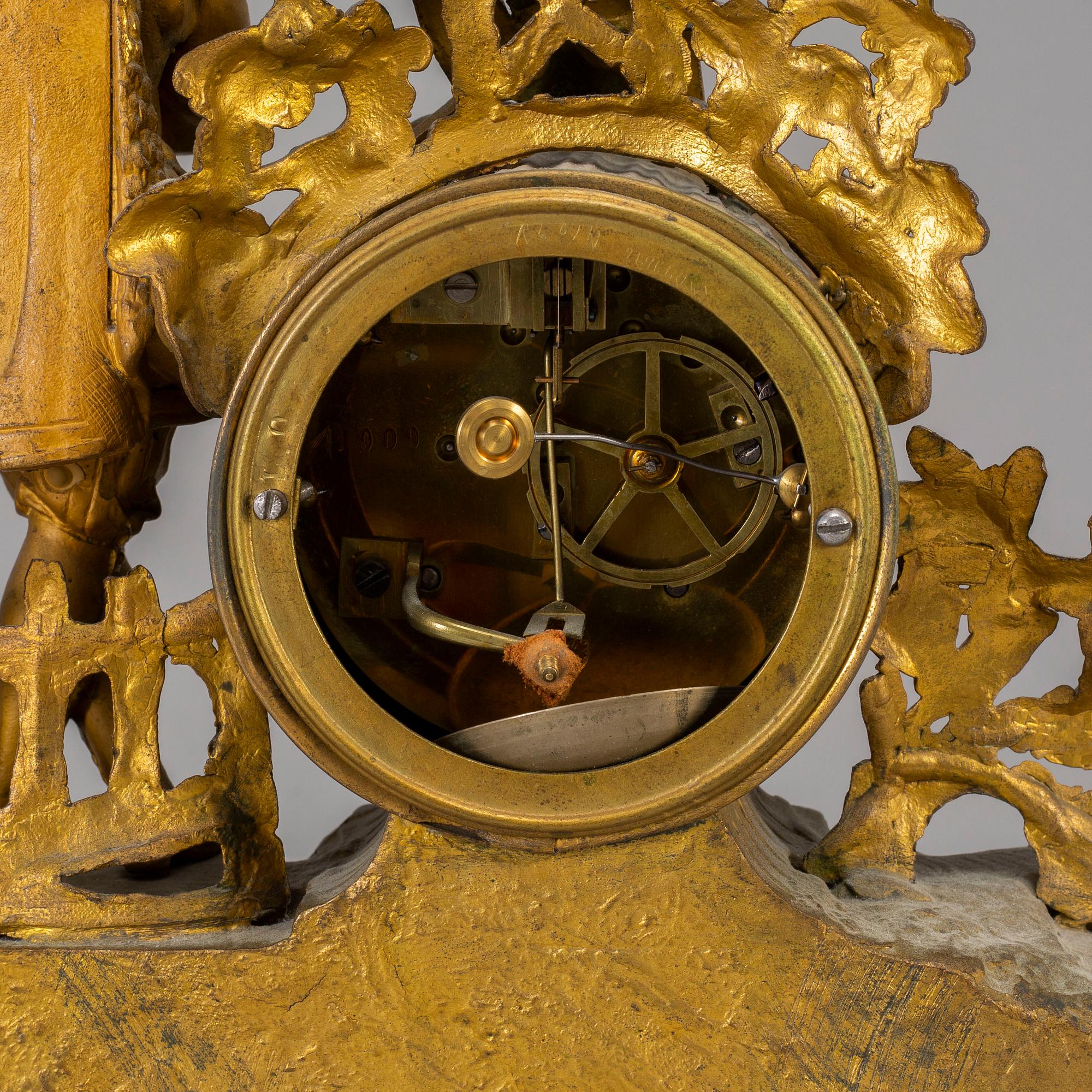 A  19th/20th century mantle clock in Louis-XVI style.