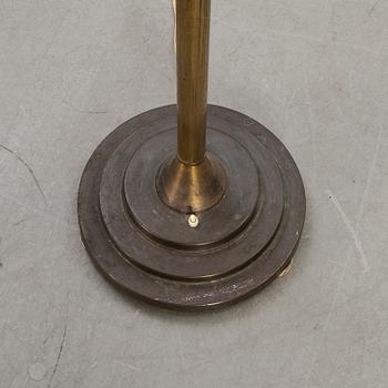 A 1930s Art Deco brass uplight.