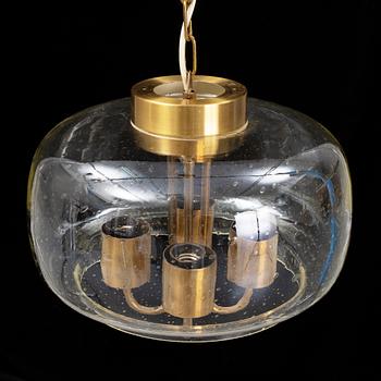 A 1960/70s glass and brass ceiling lamp.