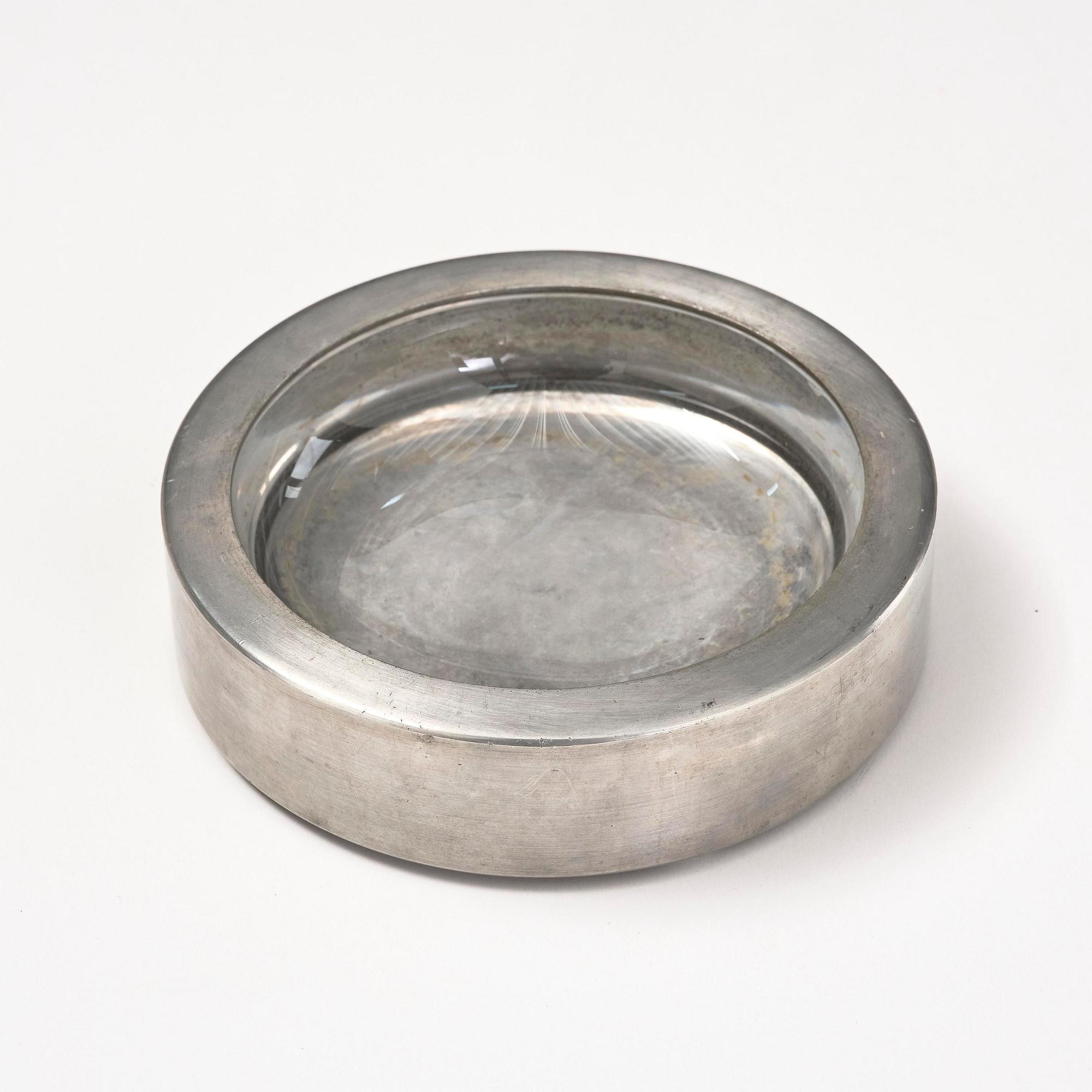 Firma Svenskt Tenn, a pewter and glass ashtray/bowl, Stockholm, 1950.