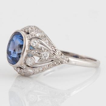 An A Tillander platinum ring set with a faceted sapphire ca 4.25 cts.