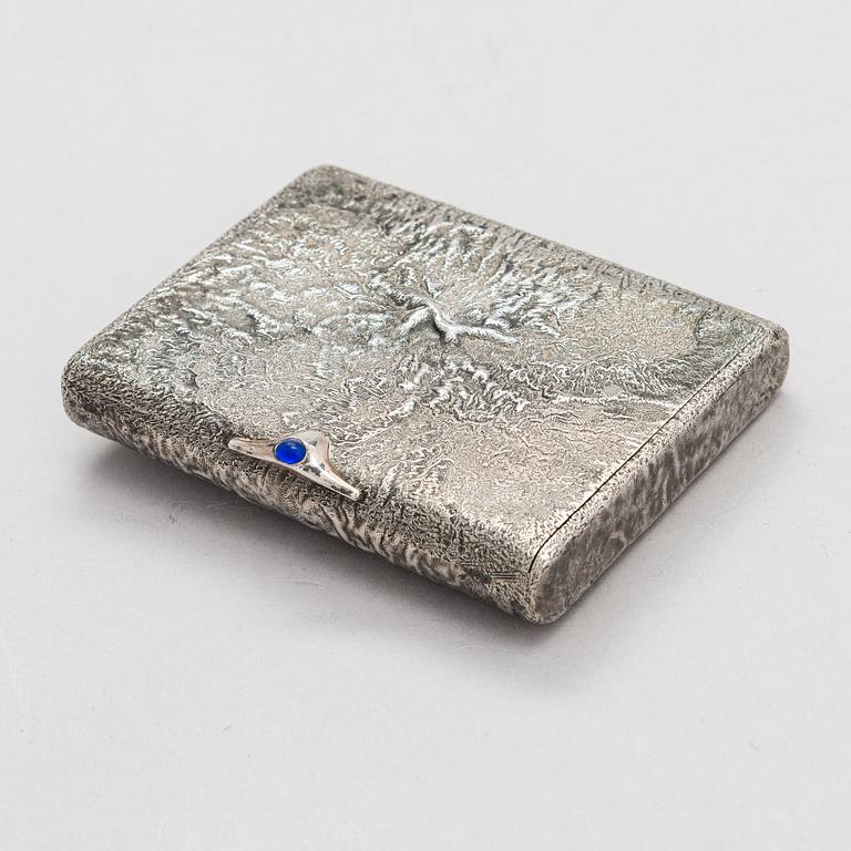 A Russian, early 20th century silver cigarette case, samorodok technique.
