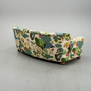 A model 968 sofa by Josef Frank for Firma Svenskt Tenn.