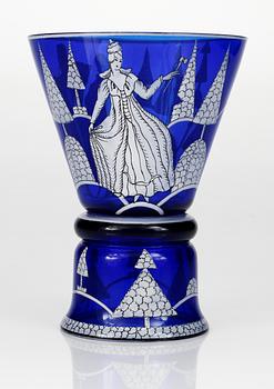 A Wiener Werkstätte blue glass goblet in a design by Josef Hoffmann. Signed WW.