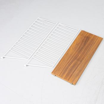 Nils Strinning, a "String" book case with cabinet, Sweden, 21st century.