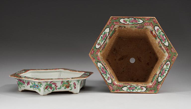 A Canton famille rose flower pot with stand, Qing dynasty, 19th Century.