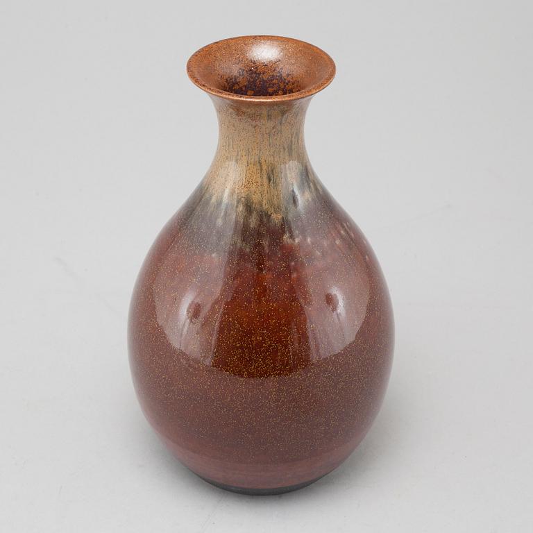 a stoneware vase for Designhuset, signed CHS.