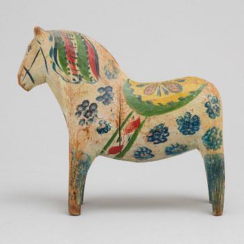 A Dala horse, painted pine, circa 1900.