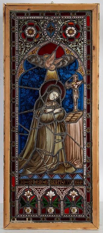 A stained glass window with St Theresa, late 19th Century.