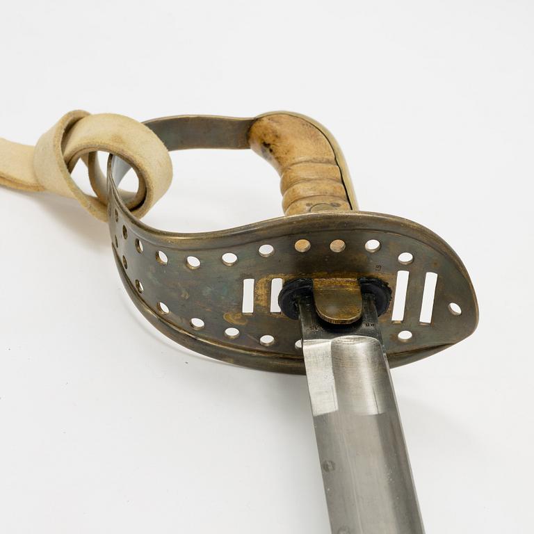 A  Swedish cavalry sword, 1867 pattern, with scabbard.