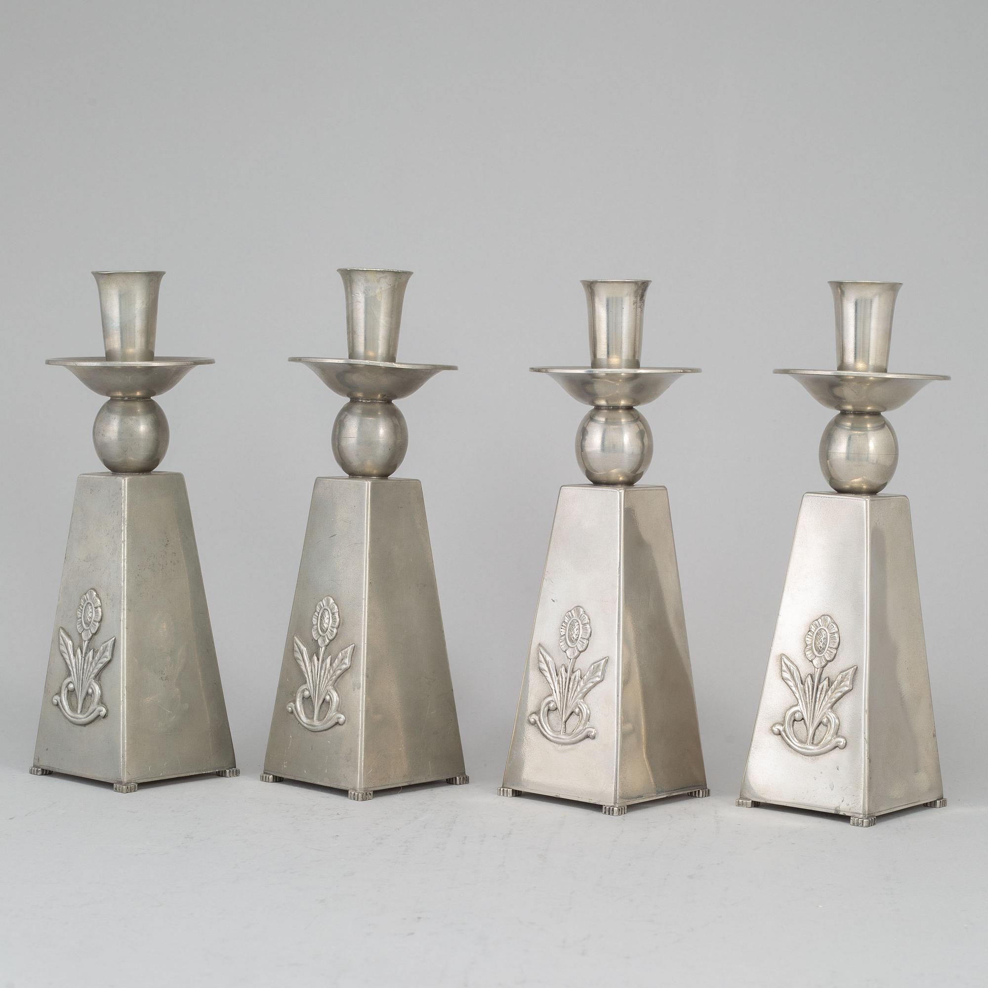 GAB (Guldsmedsaktiebolaget) TENN, a set of four pewter candlesticks, Stockholm 1950's.