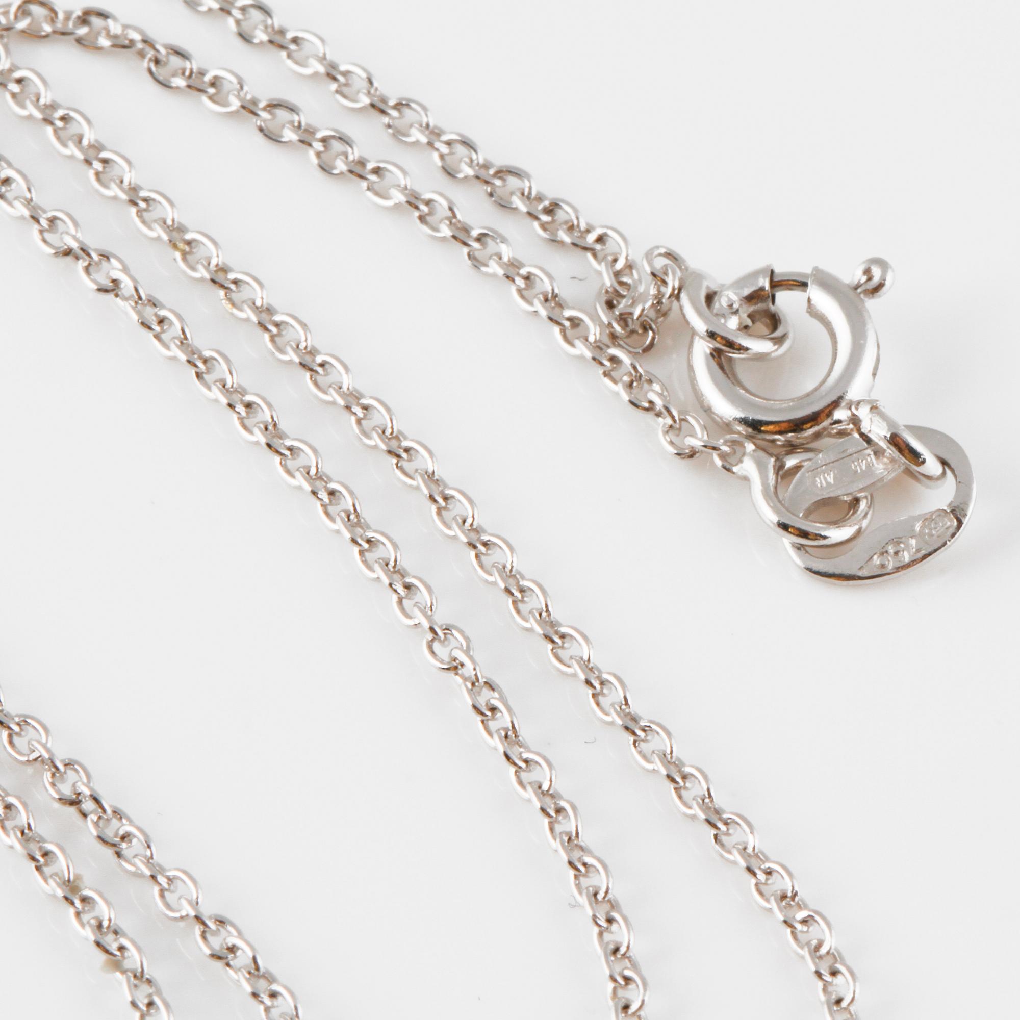 HÄNGE, 18K vitguld med fasettslipade rubiner ca 1.55 ct. Vikt 4,9 gram.