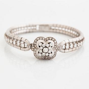 Omega brilliant cut diamond watch.