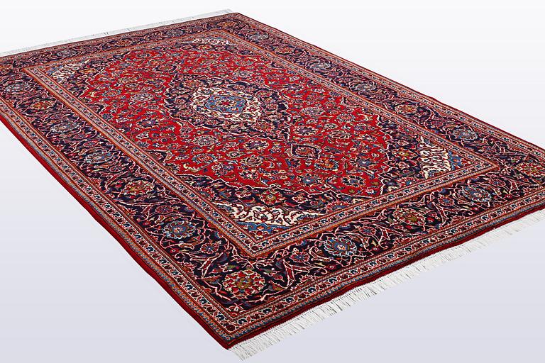 A carpet, Kashan, 308 x 202 cm.