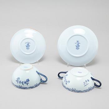 Seven "Ostindia" broth cups with sausers and chocolate cups with sausers in earthenware, Rörstrand, 20th century.