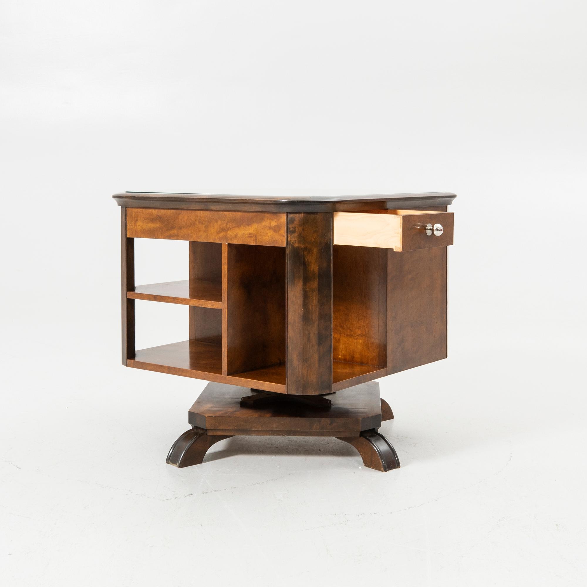 Rotating table with fitted bar, 1930s/40s.