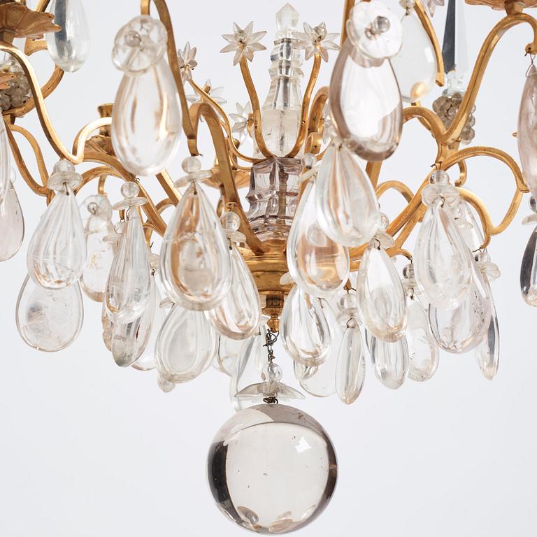 A Louis XV-style rock crystal eight-light chandelier, 20th century.