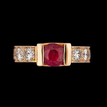 1054. A ruby and diamaond ring app. tot. 1 ct.