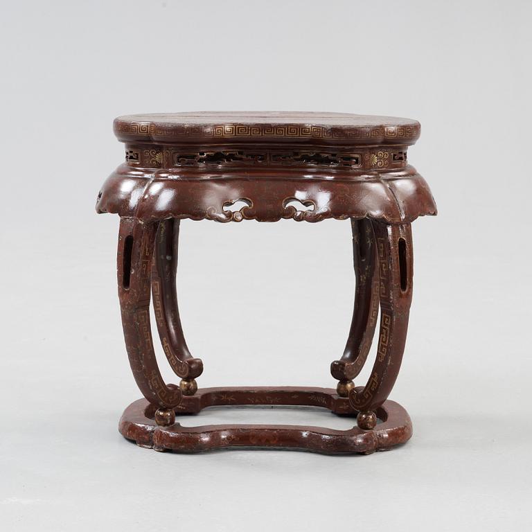 A red and gold lacquer stool, Qing dynasty presumably 18th century.