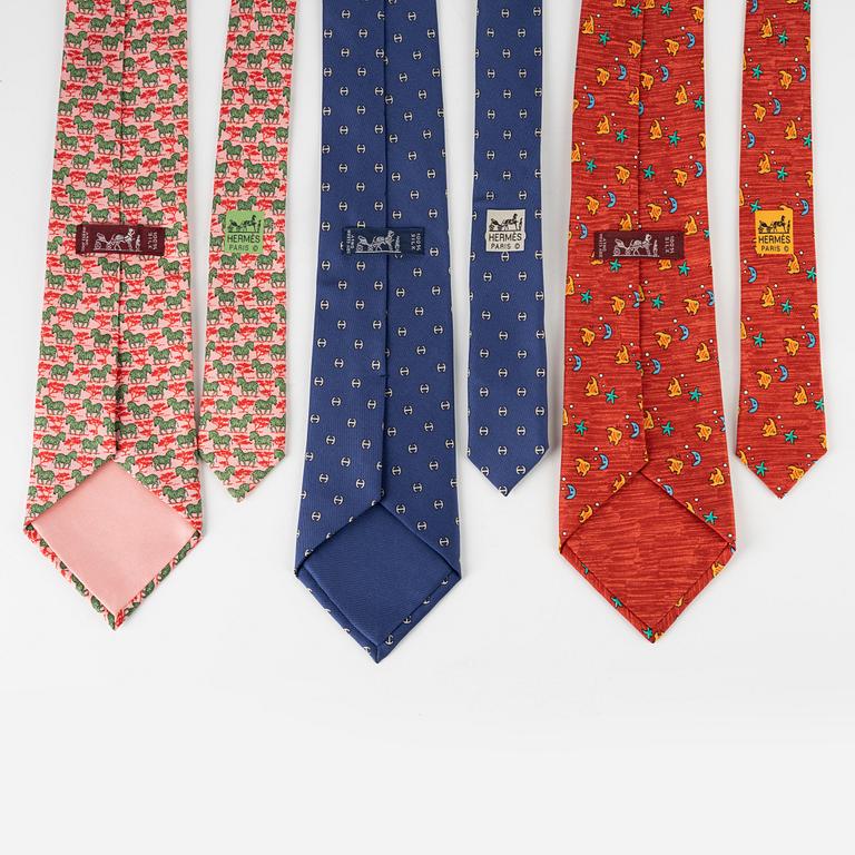 Hermès, a set of three silk ties.