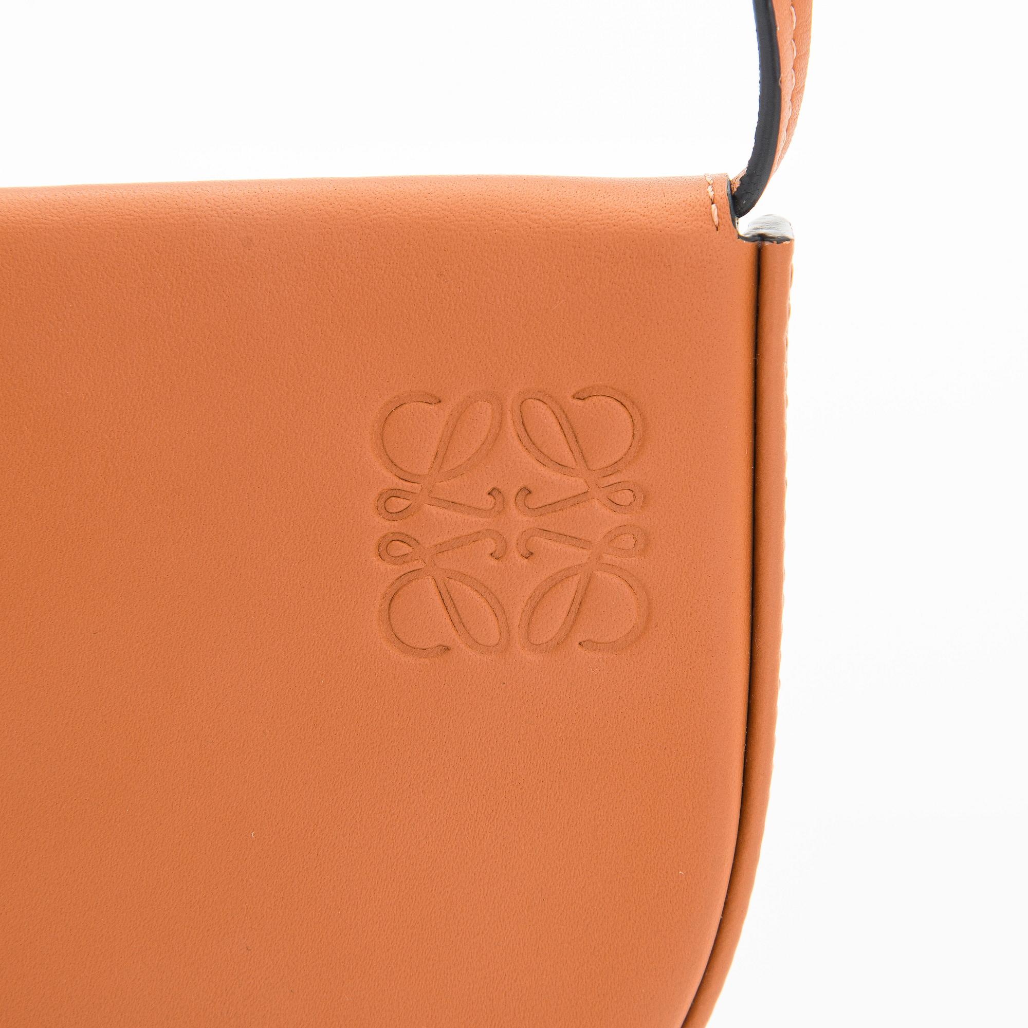 Loewe, a 'Small Heel Pouch' bag.
