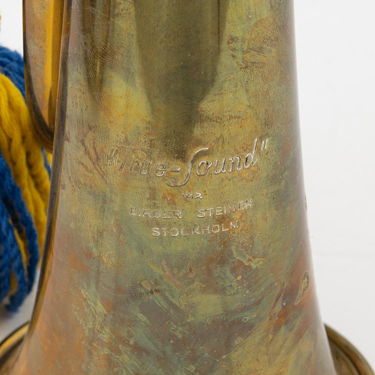 Two military brass signal horns, one marked 'True Sound' Birger Steiner Stockholm.