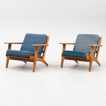 Hans J Wegner, a pair of oak model GE-290, Getama, Gedsted, Denmark.