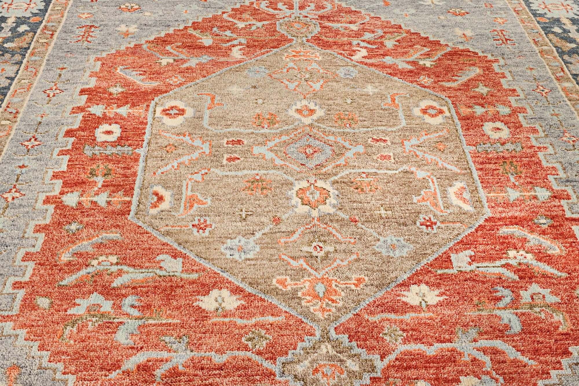 An oriental carpet with Mamluk design, c. 359 x 281 cm.